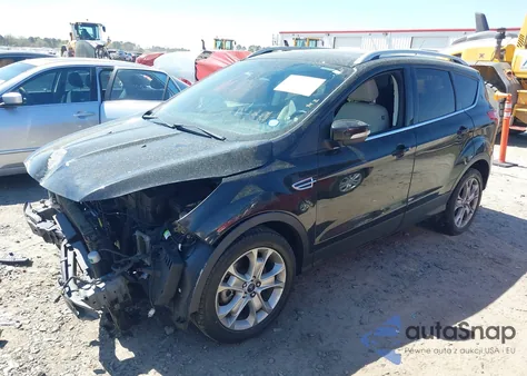 2015 Ford Escape Titanium z USA, uszkodzony, nr VIN 1FMCU0J91FUB36973